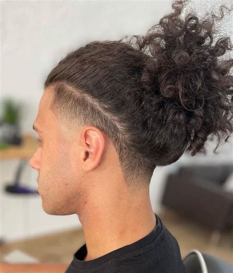 taper fade with ponytail